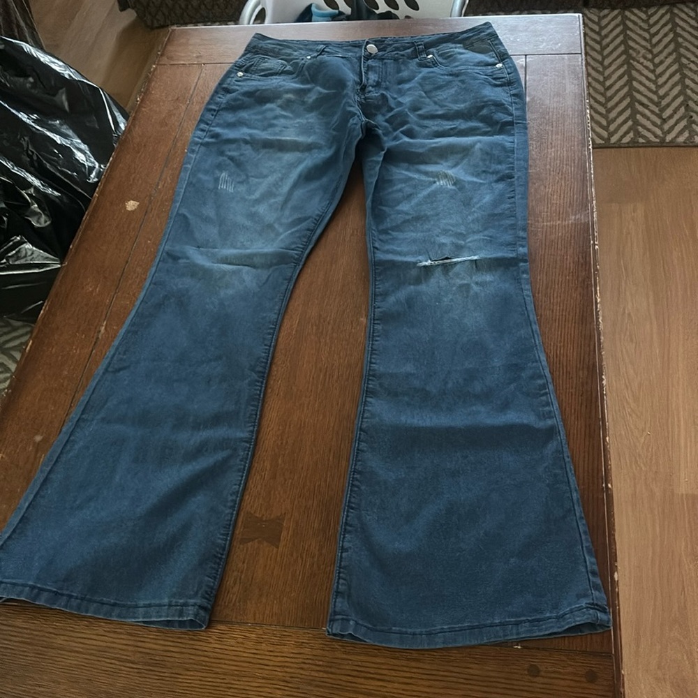 Jeans distressed medium wash flare